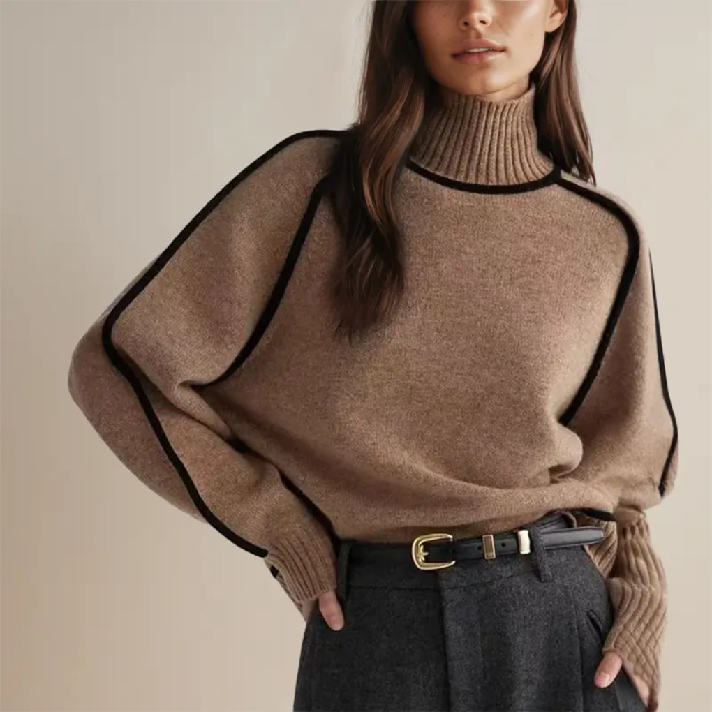 Blød rullekravebluse med strikket design